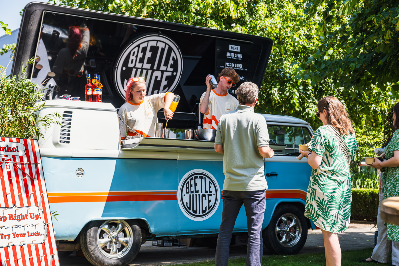 Guests being served at the Beetle Juice bus bar