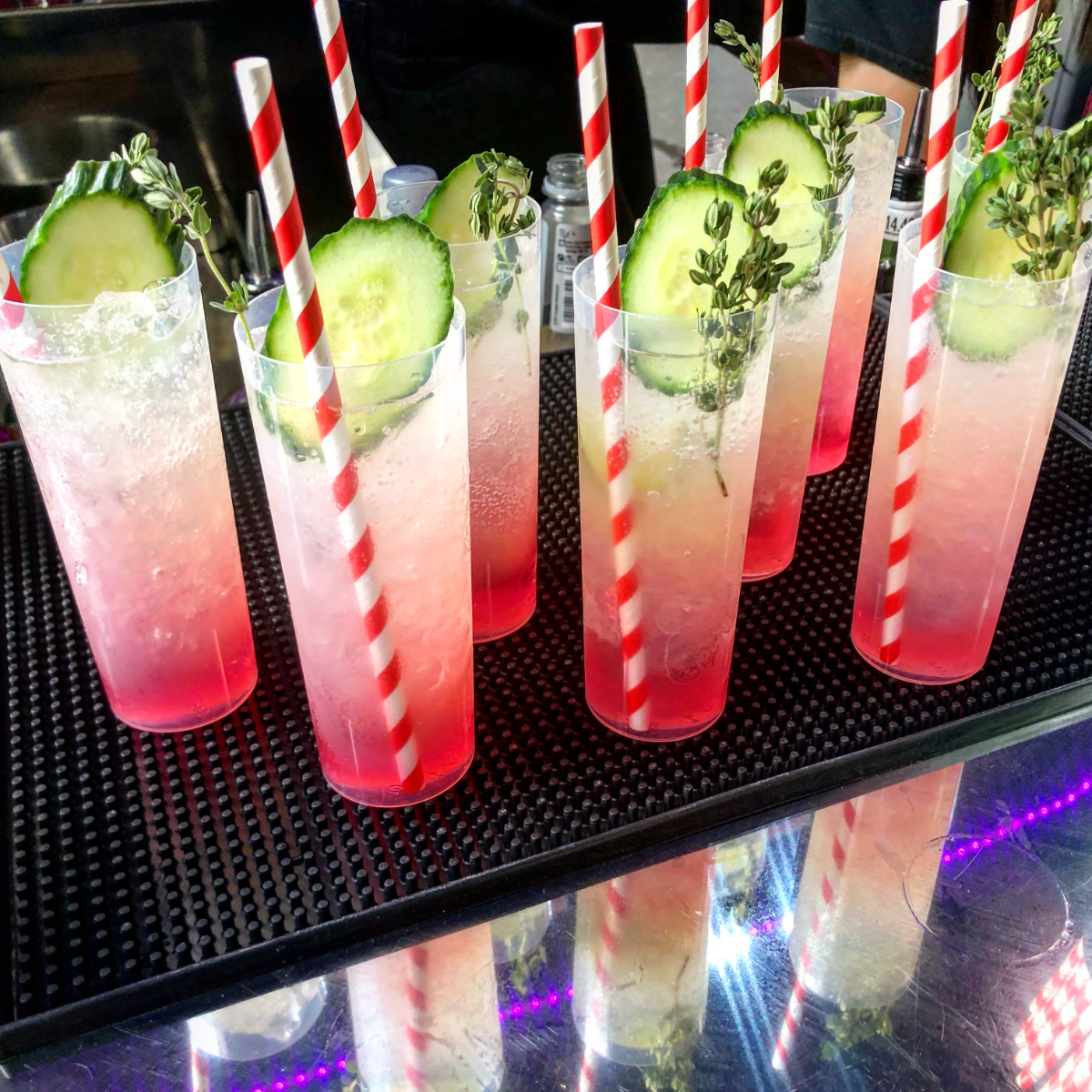 Signature cucumber and thyme cocktails on the bar